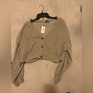 South moon under beige sweater